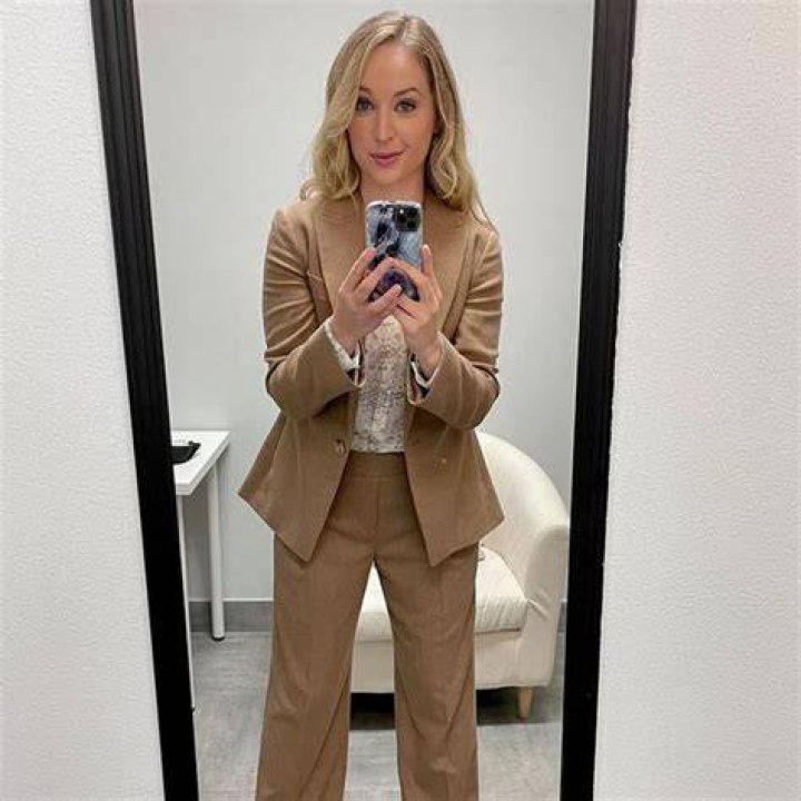 Allison Siko posing for a photo shoot for her Instagram feed.