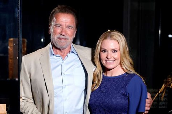 Arnold Schwarzenegger with Heather Milligan