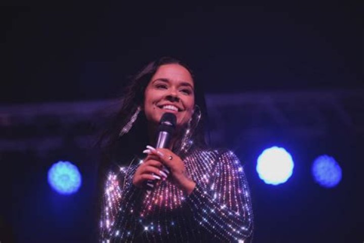Brooke Simpson is the singer and song writer.