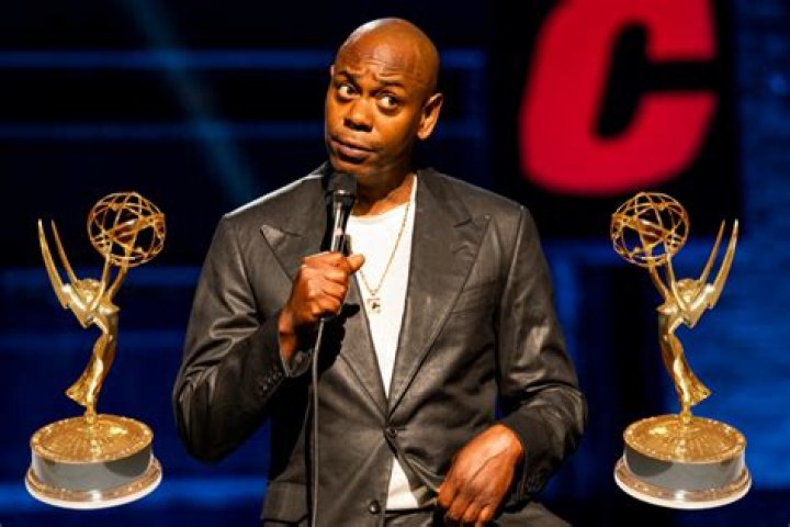 Chappelle showing his two Emmy Awards