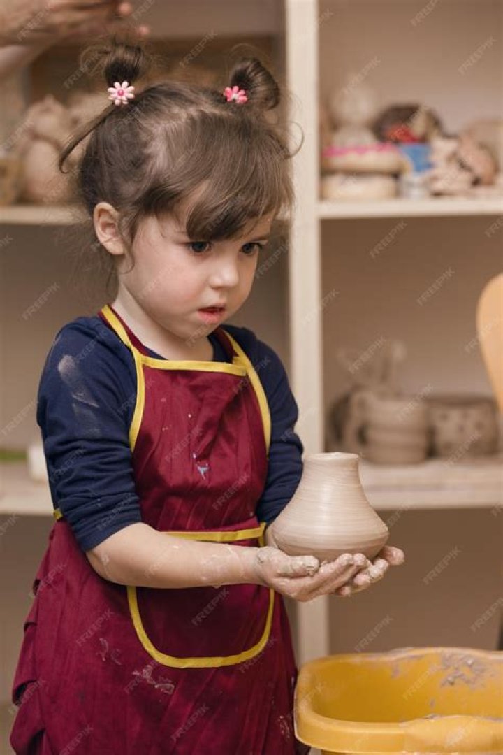 Girl and a Pottery