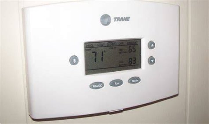 How do I lock my Trane thermostat?
