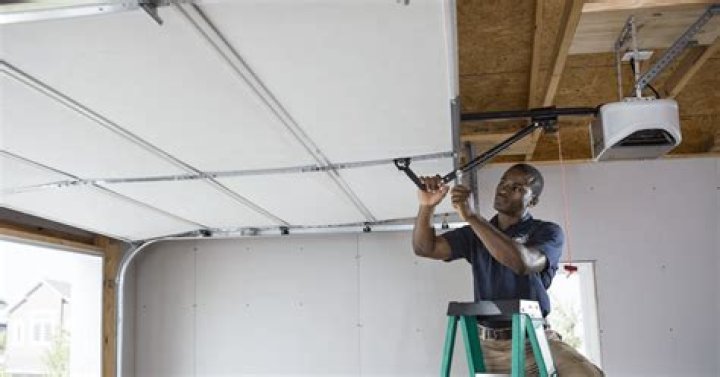 How much does Lowes charge to install a garage door?