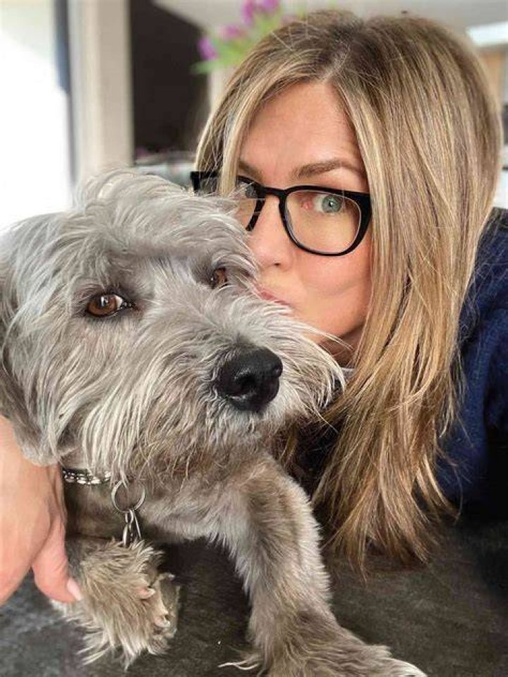 Jennifer Aniston with her dog Dolly as a puppy