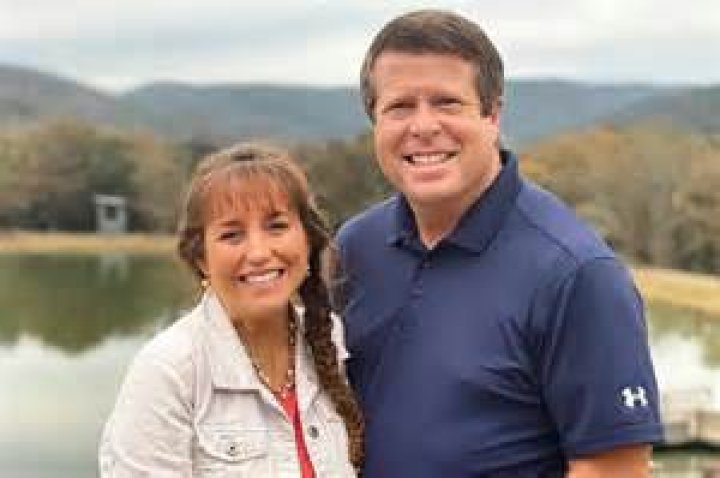 jim bob and michelle duggar sharing drink