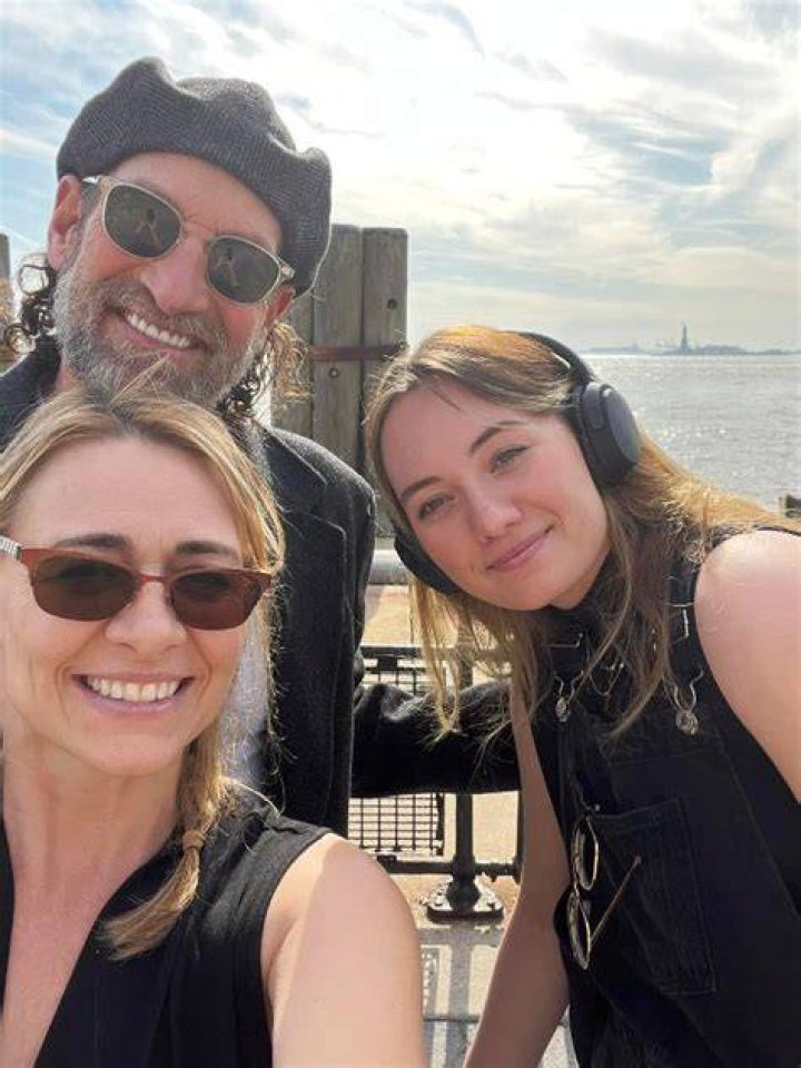 Kyra Monique Kotsur posing with her father, Troy Kotsur and her mother, Deanne Bray in her early days.