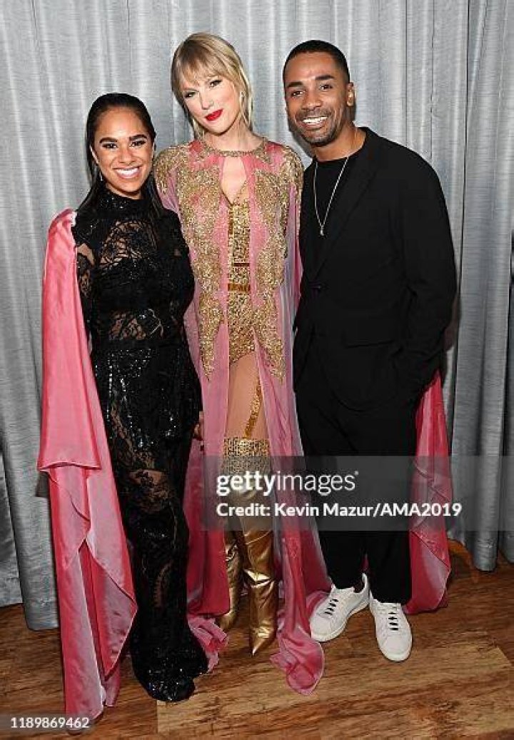 Misty Copeland, Taylor Swift and Craig Hall attend the 2019 American Music Awards at Microsoft Theater on November 24, 2019 in Los Angeles, Califor...