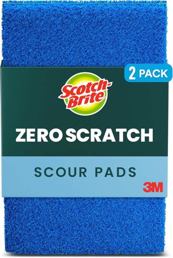 Will a scouring pad scratch glass?